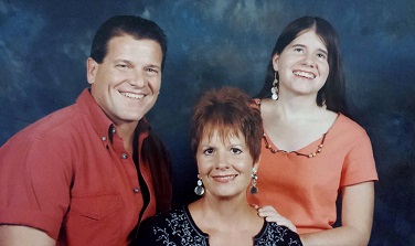 The Mitzel Family - Roger, Sheri, and Jamie.